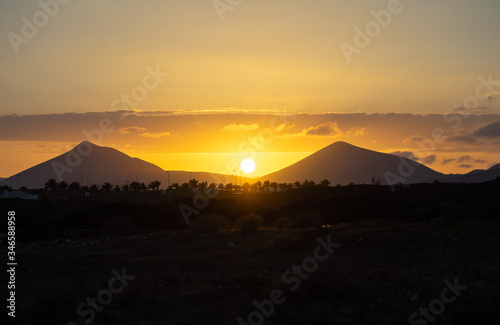 Landscape of Tenerife's volcanic mountains at sunset