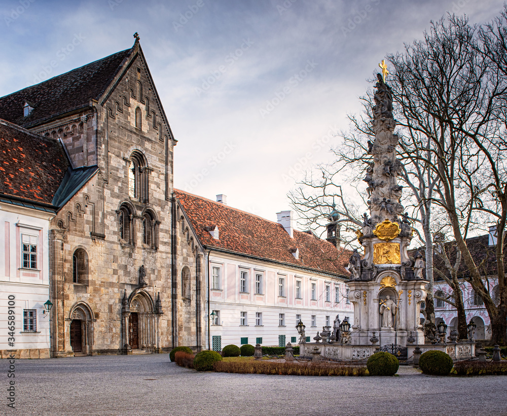 HEILIGENKREUZ, AUSTRIA - 13 FEBRUARY, 2020: Inner Yard and View of the Cistercian monastery Heiligenkreuz abbey in Heiligenkreuz, Austria. HEILIGENKREUZ, AUSTRIA - 13 FEBRUARY, 2020: Inner Yard and View of the Cistercian monastery Heiligenkreuz abbey in Heiligenkreuz, Austria.