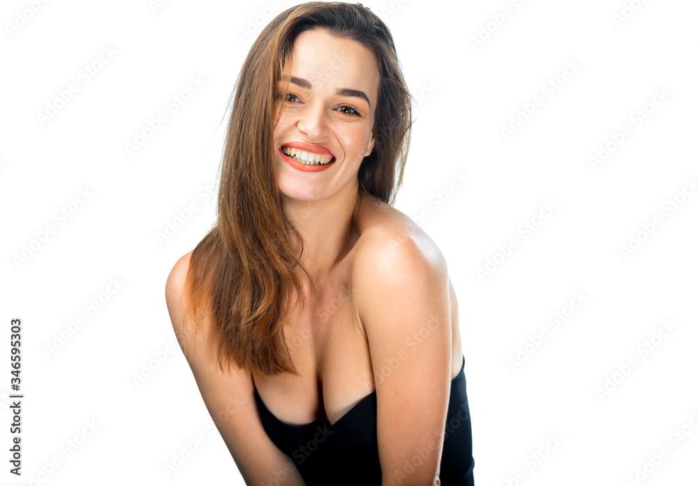 Portrait of charming beautiful woman in deep neckline clothes. Girl with big eyes smiles to the camera. White background. Pretty female with closed eyes in black lingerie. Portrait of charming beautiful woman in deep neckline clothes. Girl with big eyes smiles to the camera. White background. Pretty female with closed eyes in black lingerie.