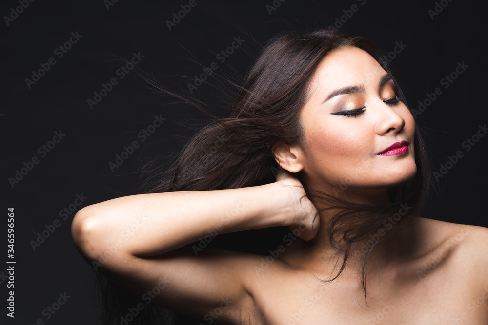 Portrait of young asian woman with makeup long hair.