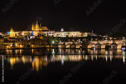 Czech Republic. Cityscape of Prague at night with view of Charles Bridge and Prague Castle.