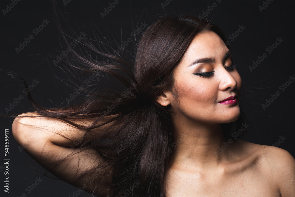 Fototapeta premium Portrait of young asian woman with makeup long hair.