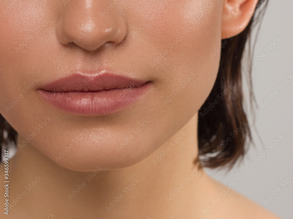 Closeup plump Lips. Lip Care, Augmentation, Fillers. Macro photo with Face detail. Natural shape with perfect contour. Close-up perfect natural lip makeup beautiful female mouth. Plump sexy full lips Closeup plump Lips. Lip Care, Augmentation, Fillers. Macro photo with Face detail. Natural shape with perfect contour. Close-up perfect natural lip makeup beautiful female mouth. Plump sexy full lips