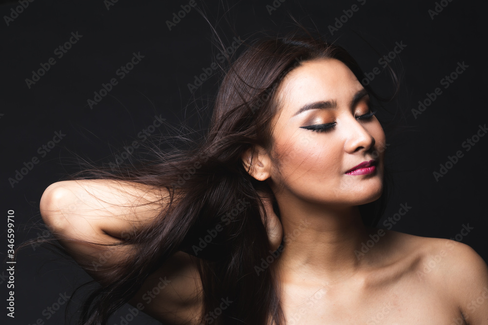 Portrait of young asian woman with makeup long hair. Portrait of young asian woman with makeup long hair.