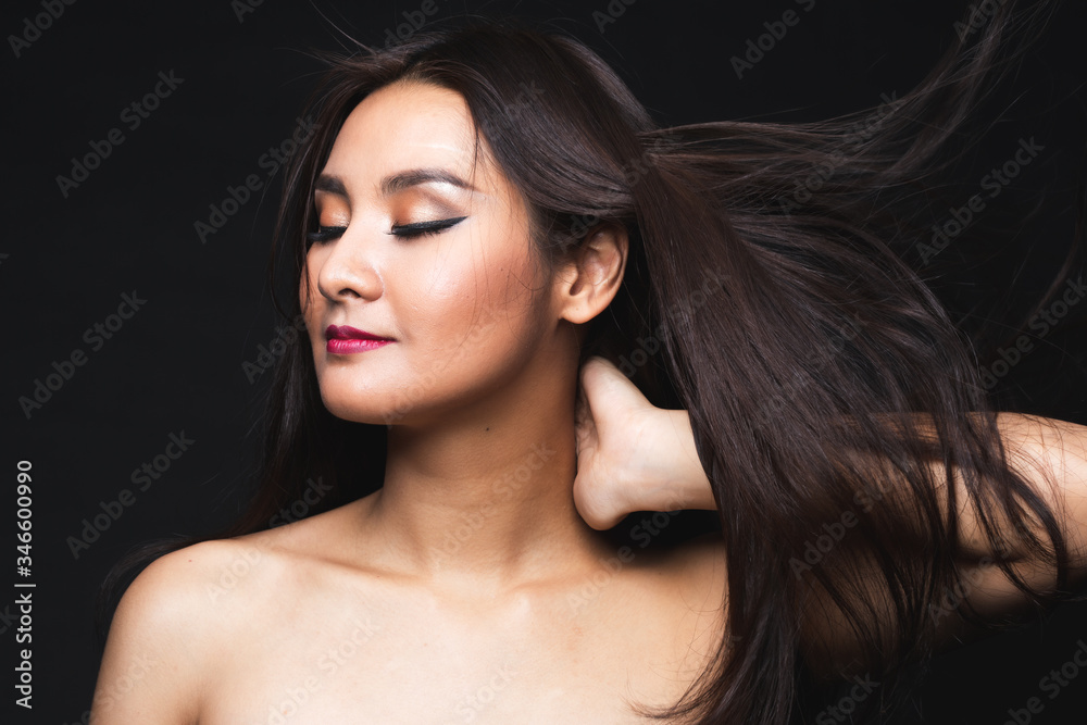 Portrait of young asian woman with makeup long hair.