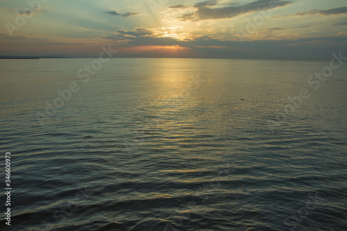 Caspian Sea. Azerbaijan Baku Beautiful sunset in yellow as background. Azerbaijan nature . The sunset  the sea and the clouds.