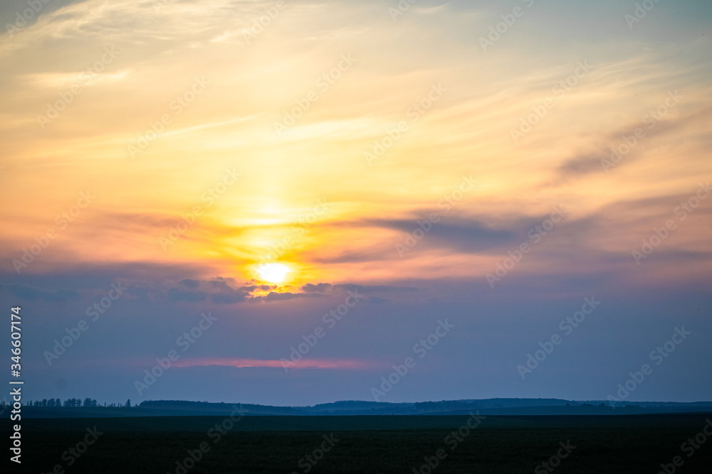 Picturesque sky with clouds during sunset. Landscape with evening sky