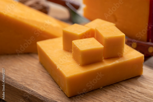 Red waxed yellow cheddar cheese close up