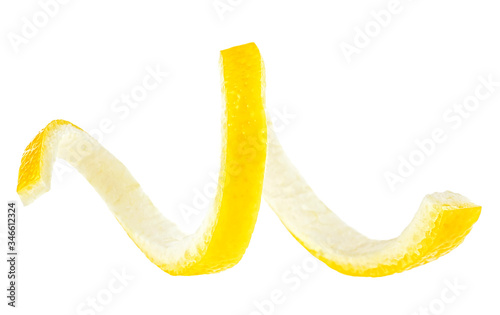 Lemon peel isolated on a white background. Lemon zest spiral.