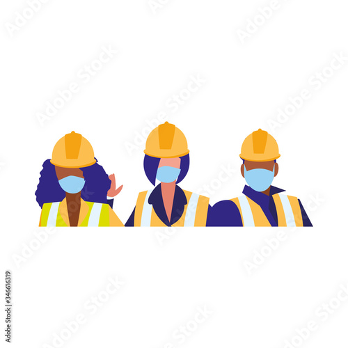 Industrial workers working with face mask © djvstock