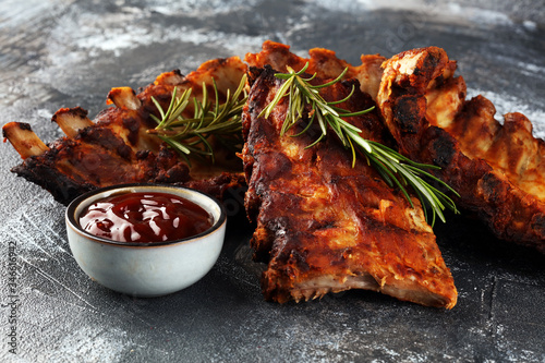 Grilled spare ribs for a tasty bbq meat with hot spicy barbecue sauce