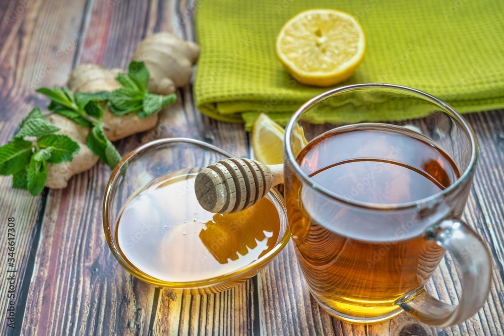 A cup of tea on a wooden table image
