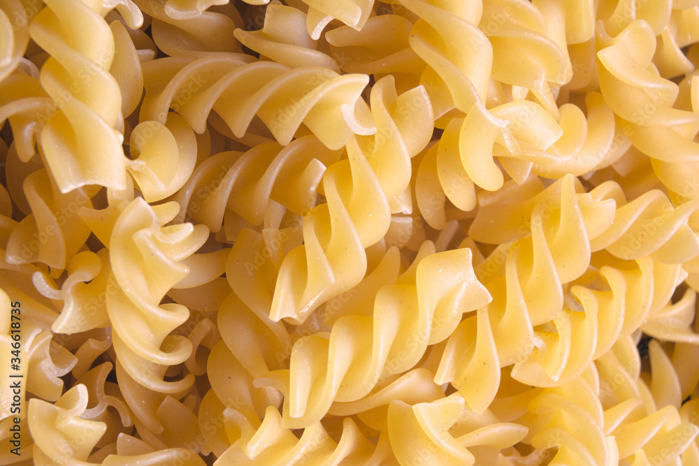 Fusilli. Pasta background. Dry pasta fusilli. Macro photo Fusilli. Pasta background. Dry pasta fusilli. Macro photo