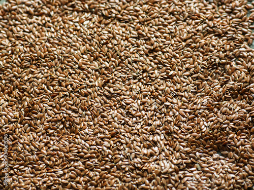 Lots of flax in brown grains, close-up. There is a place for the text.