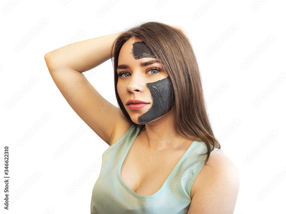 Clay mask purifying mud facial treatment for women. Black clay cosmetic mask for the face. Cosmetic mask on the model isolated on white background. Clay mask purifying mud facial treatment for women. Black clay cosmetic mask for the face. Cosmetic mask on the model isolated on white background.