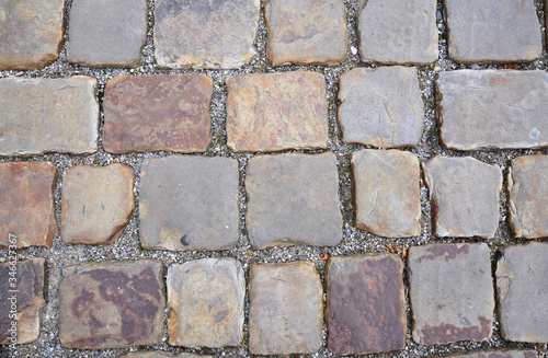 Historic cobblestones photographed from above as a background