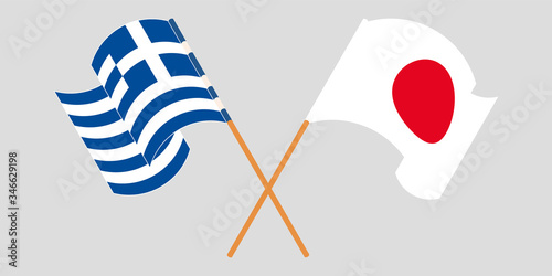 Crossed and waving flags of Greece and Japan