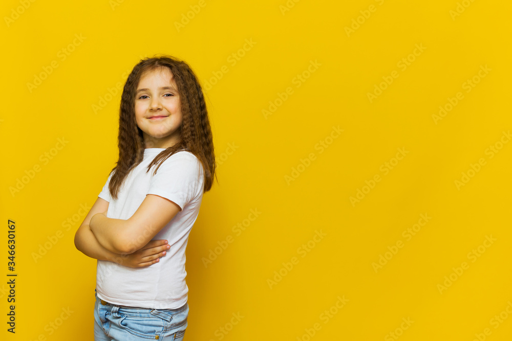 Beautiful little fashion model on Yellow studio background. Beautiful little fashion model on Yellow studio background.