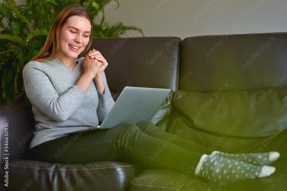 young beautiful woman using a laptop computer at home young beautiful woman using a laptop computer at home