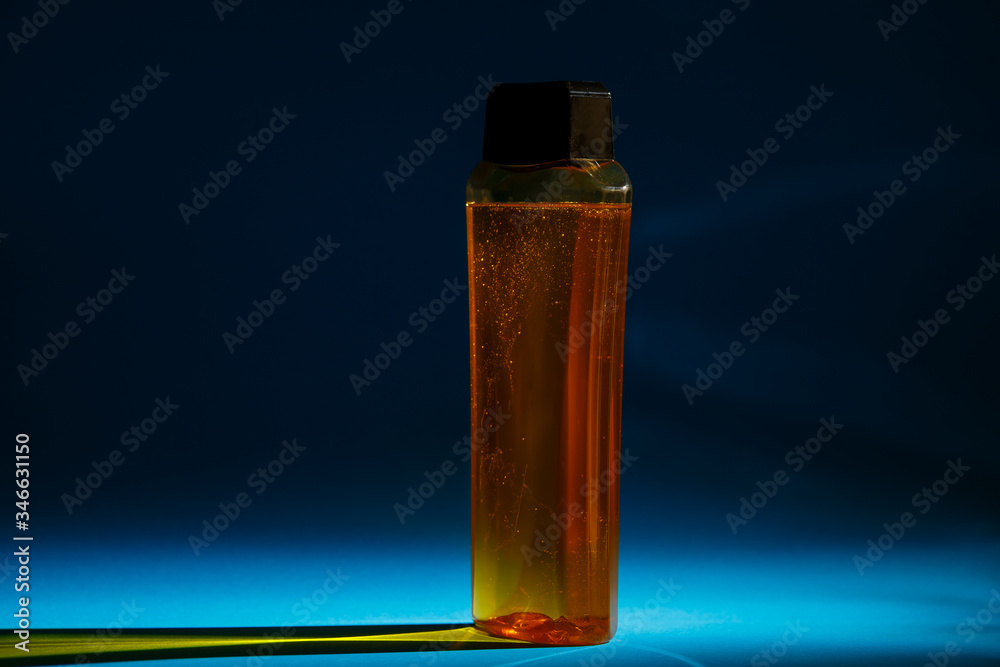 bottle with cream, shampoo for hair, shower gel, colored background, beautiful studio light, beauty and youth of the human body bottle with cream, shampoo for hair, shower gel, colored background, beautiful studio light, beauty and youth of the human body