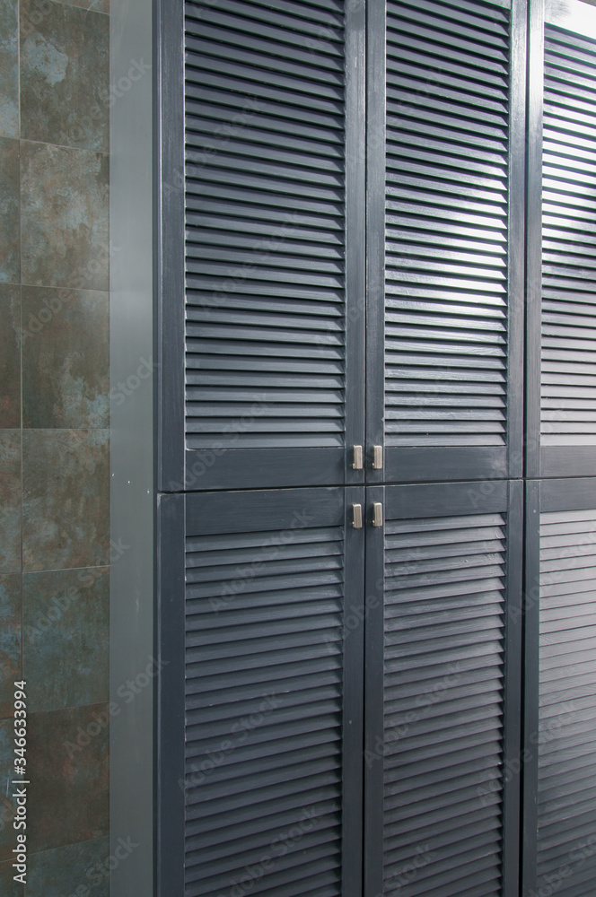 Fototapeta premium Iron shutters of a metal cabinet close-up