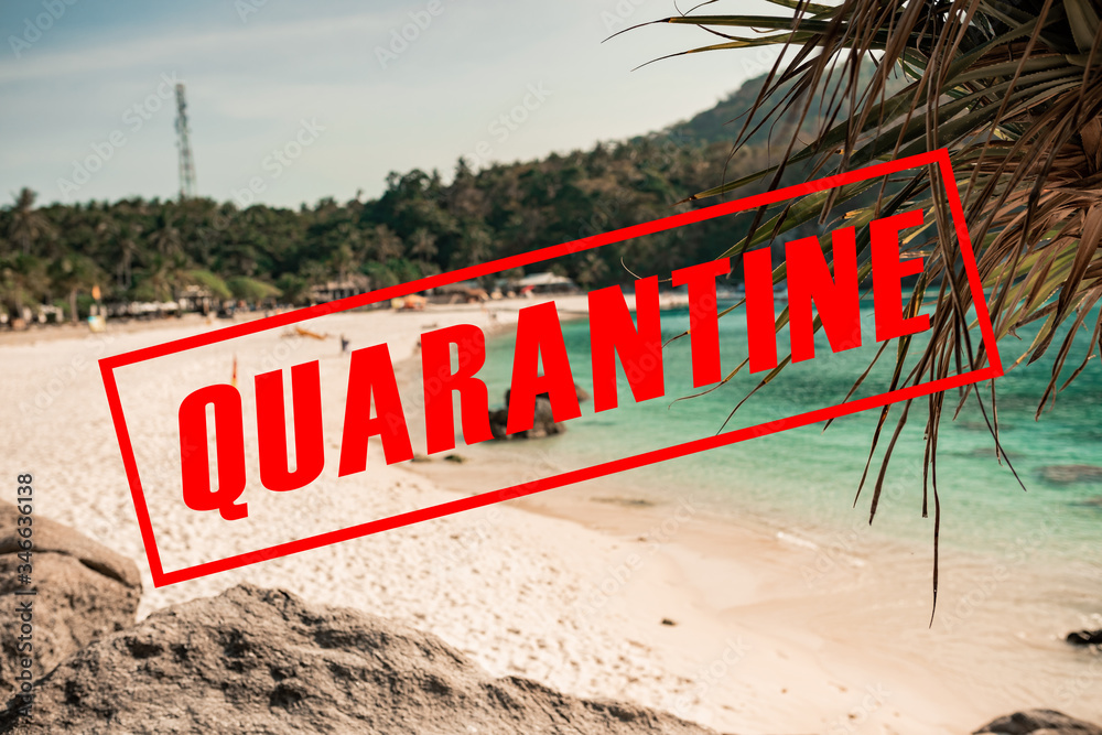 Stopped Travelling, Red Text. Quarantine text on the island with turquoise water. Landscape blue lagoon and underwater coral. Tourism, travel, vacation concept background.