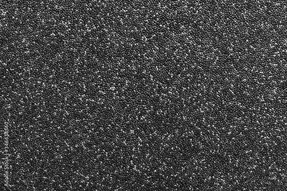 Fototapeta premium Chia seeds beautifully laid out on background. Food background. Top view. copy space. Vegetarian food.