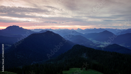 Mountain silhouettes layers of the Bavarian Alps during sunrise from Jochberg Walchensee, Bavaria Germany. © Bastian Linder