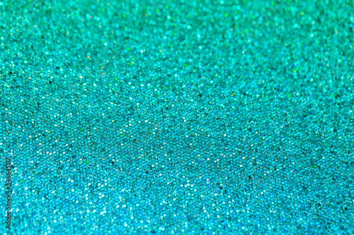 Blue-green scaly texture, bright and shiny surface