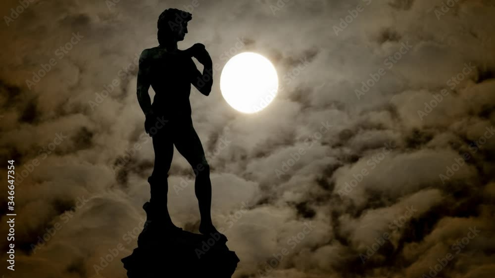 Michelangelo's David by Night with Full Moon and Dark Atmosphere, Florence, Tuscany, Italy