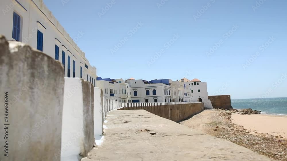 White walls of the fortress of Medina Asila, an ancient city in Morocco White walls of the fortress of Medina Asila, an ancient city in Morocco