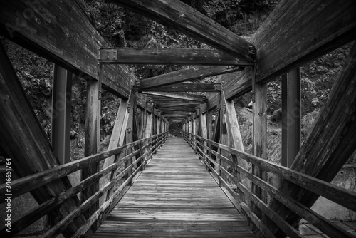 Fototapeta Old wooden bridge in black and white