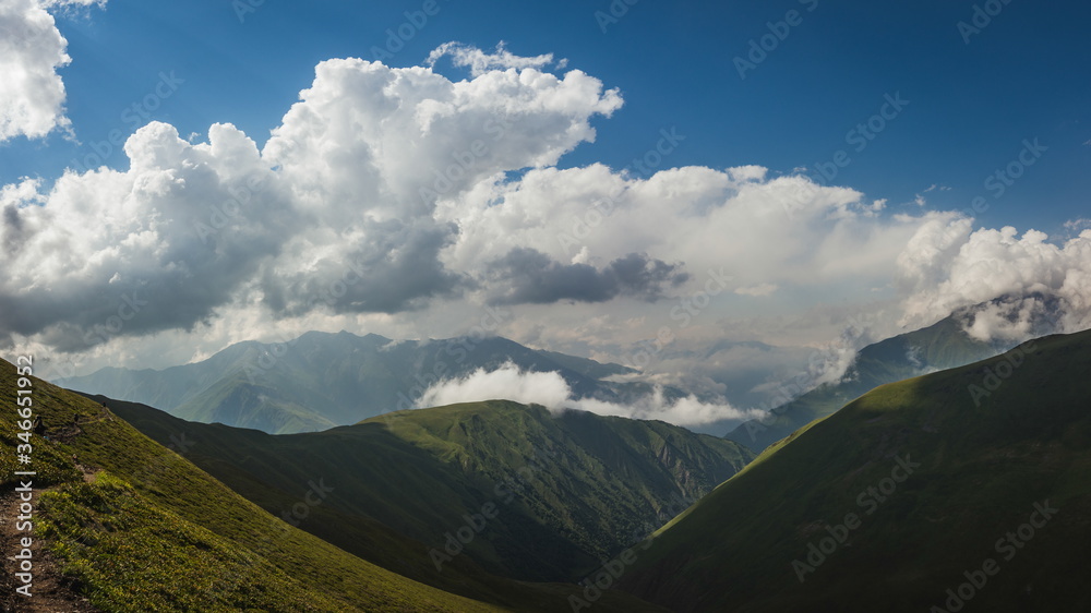 Fototapeta premium Wonderful view from Khidotani ridge in Khevsureti national park in georgian Caucasus. Omalo Shatili trek.
