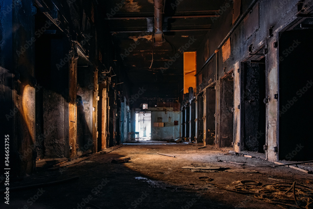 Burnt interior of industrial building or warehouse. Consequences of fire Burnt interior of industrial building or warehouse. Consequences of fire