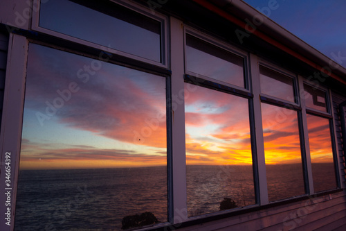 sunset over the sea window