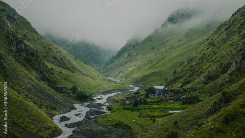 View on Khonischala village in Georgia. In valley of Khonistskali river. Omalo Shatili trek. photo