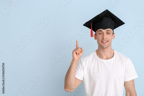 Young man in graduation hat...