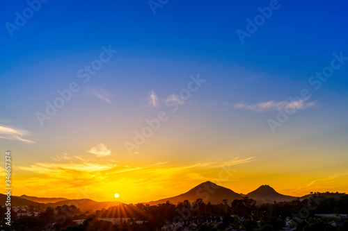 Sunset over Silhouetted Mountains