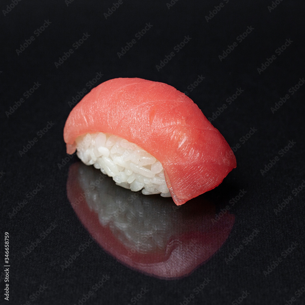 diverse delicious sushi roll set on a black background with reflection, menu diverse delicious sushi roll set on a black background with reflection, menu
