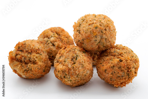 Vegan ethnic food and vegetarian nutrition concept with falafel balls isolated on white background with clipping path cutout