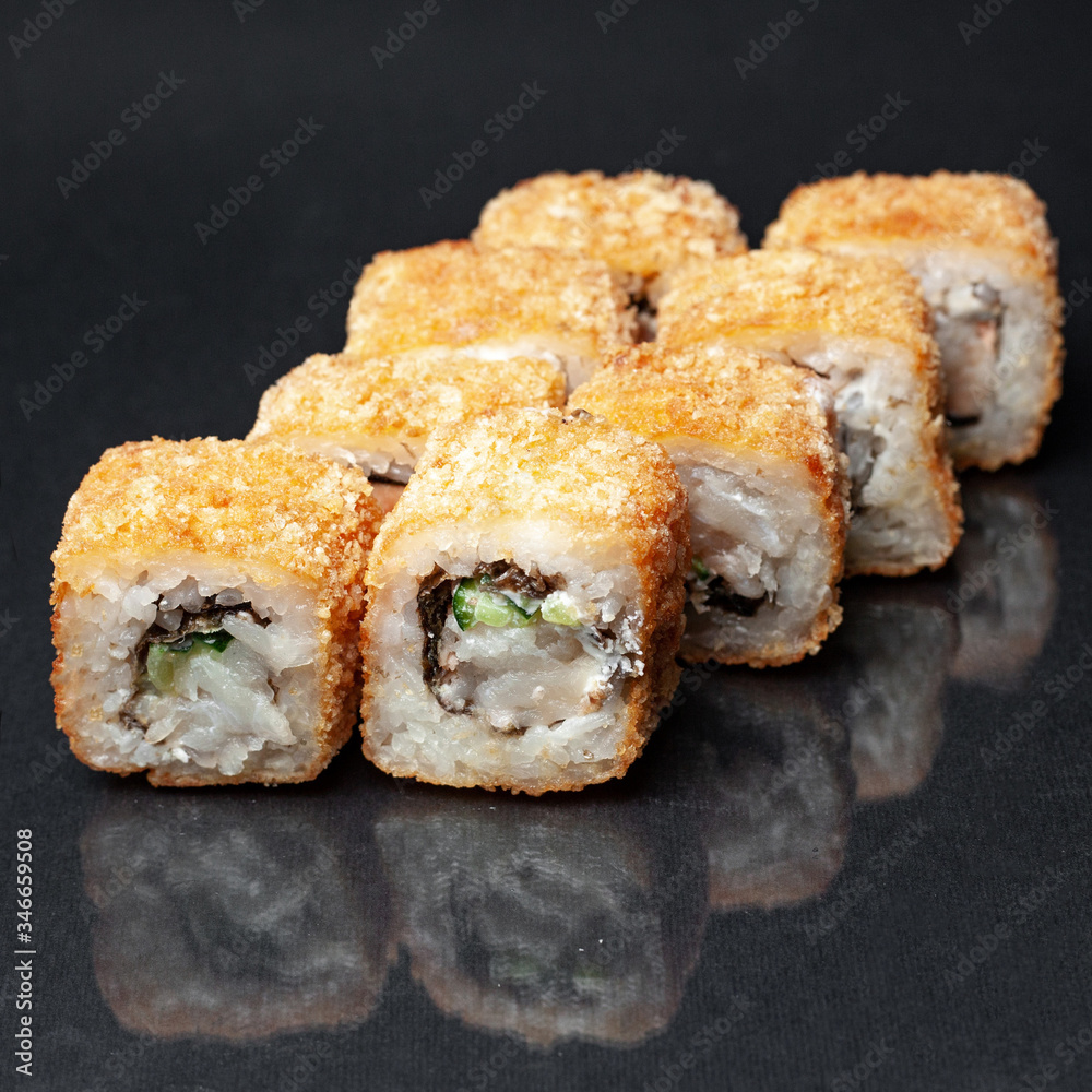 diverse delicious sushi roll set on a black background with reflection, menu diverse delicious sushi roll set on a black background with reflection, menu