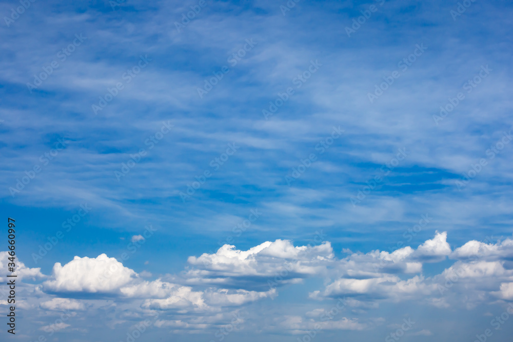 White clouds on the sky passing through. Low clouds. Background White clouds on the sky passing through. Low clouds. Background