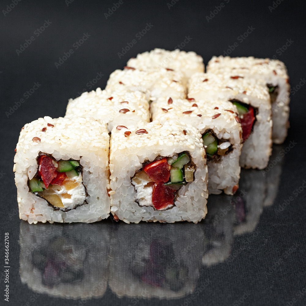 diverse delicious sushi roll set on a black background with reflection, menu diverse delicious sushi roll set on a black background with reflection, menu
