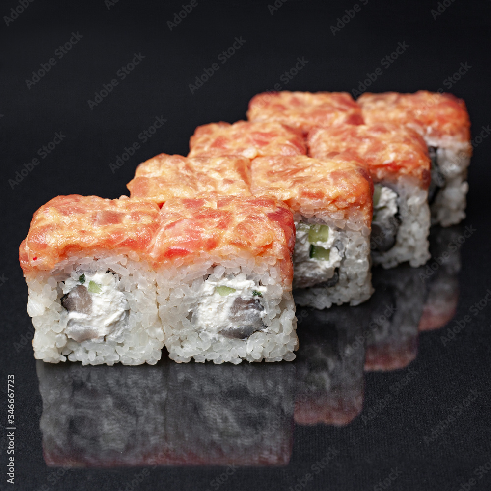 diverse delicious sushi roll set on a black background with reflection, menu diverse delicious sushi roll set on a black background with reflection, menu