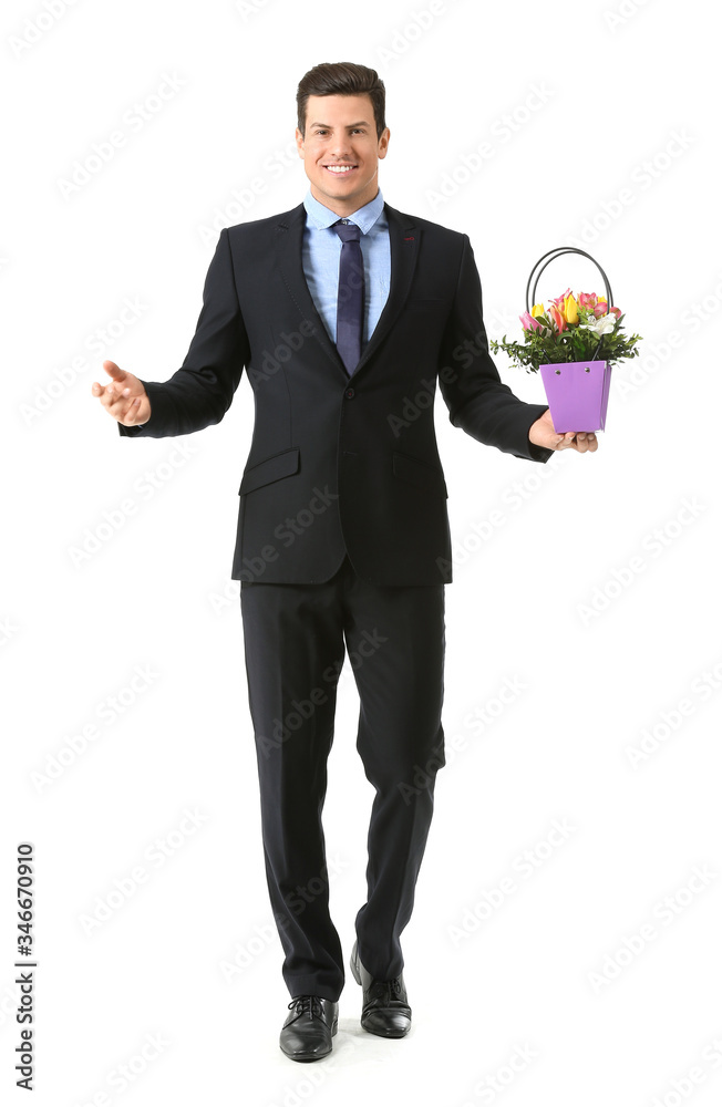 Handsome man with bouquet of flowers on white background Handsome man with bouquet of flowers on white background