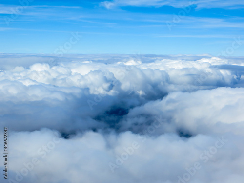 View above the clouds. Clouds, a view from airplane window. © An Instant of Time