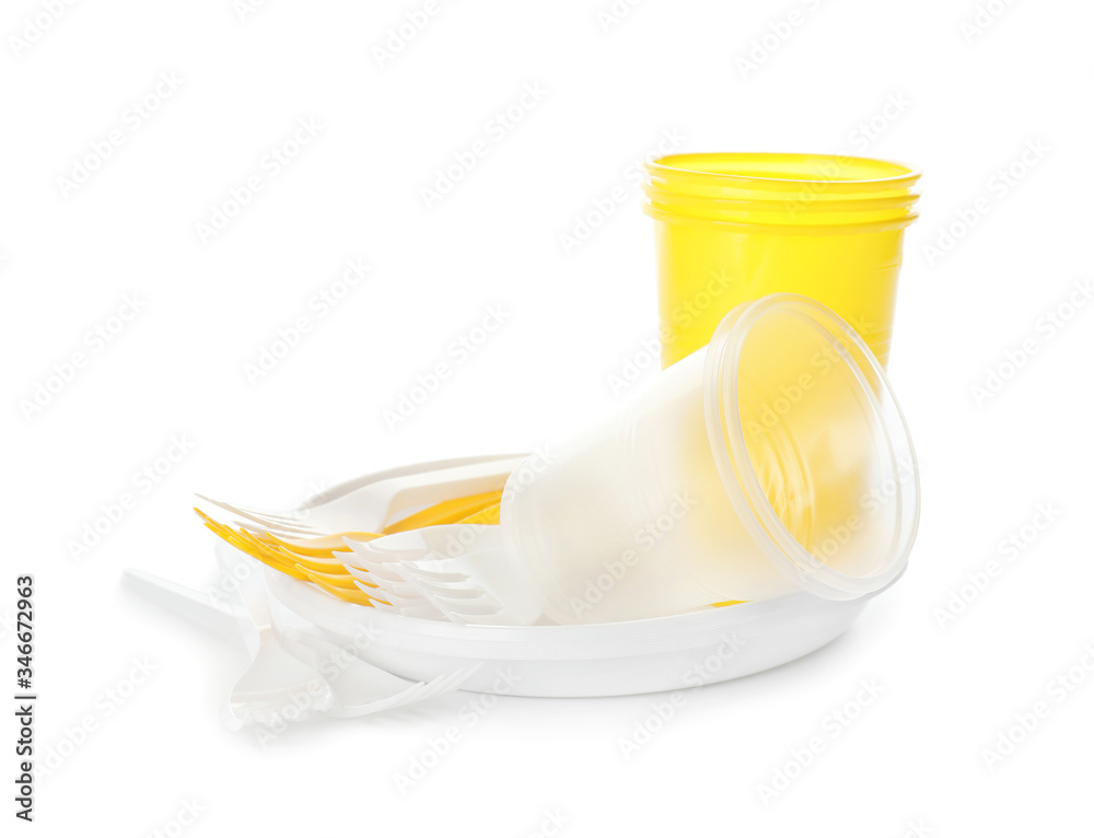 Set of plastic tableware on white background