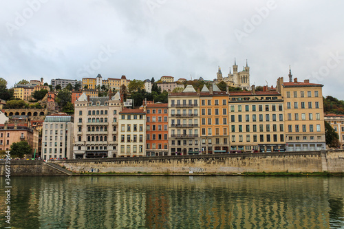 Buildings along the Saone River, Quai Fulchiron (quay), in the Old City of Lyon, in the 5th arrondissement (district), and the Fourviere hill, Lyon, France.
