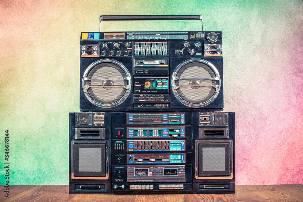 Retro boombox ghetto blaster outdated portable radio receivers with  cassette recorder from 80s front gradient colored wall background. Rap, Hip  Hop, R&B music concept. Vintage old style filtered photo Photos | Adobe