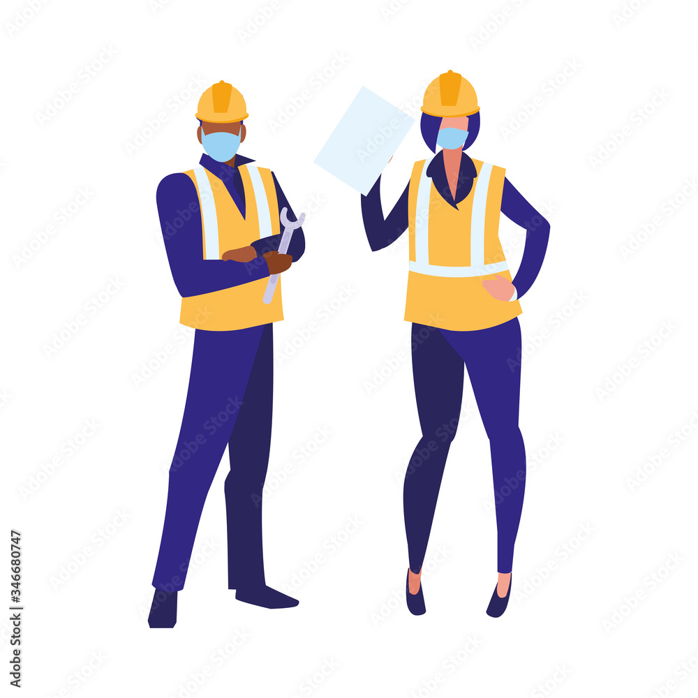 Industrial workers couple working with face mask Industrial workers couple working with face mask